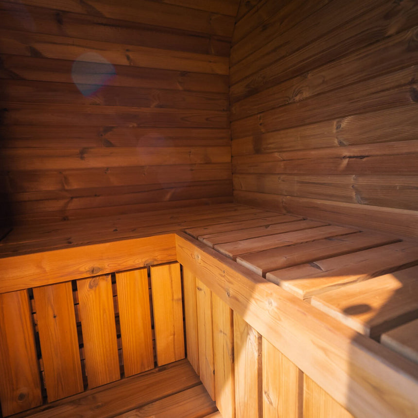 L-shaped upper bench in the corner of the Celsium Ula Mini's ThermoWood interior