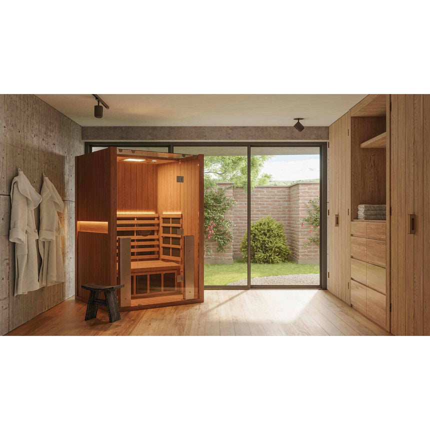 Clearlight Sanctuary 2 full spectrum infrared sauna installed in modern home with garden view