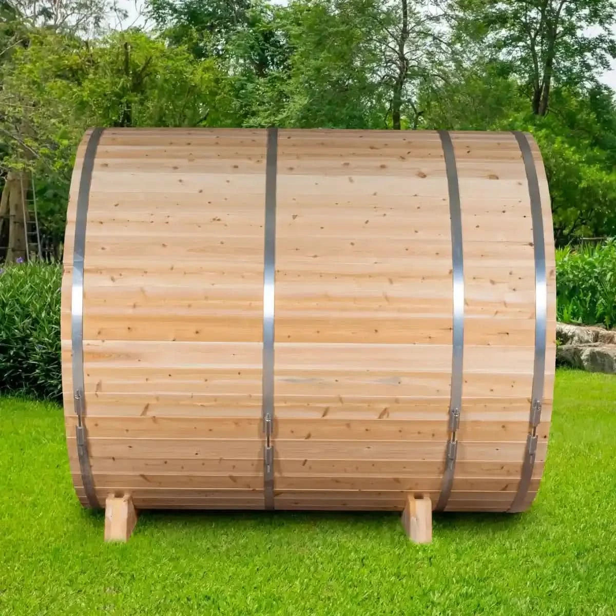 An exterior view of the Dundalk Leisure Craft CT Serenity MP Barrel Sauna (CTC2245MPE) from the back, highlighting the smooth cedar wood staves and the steel bands.