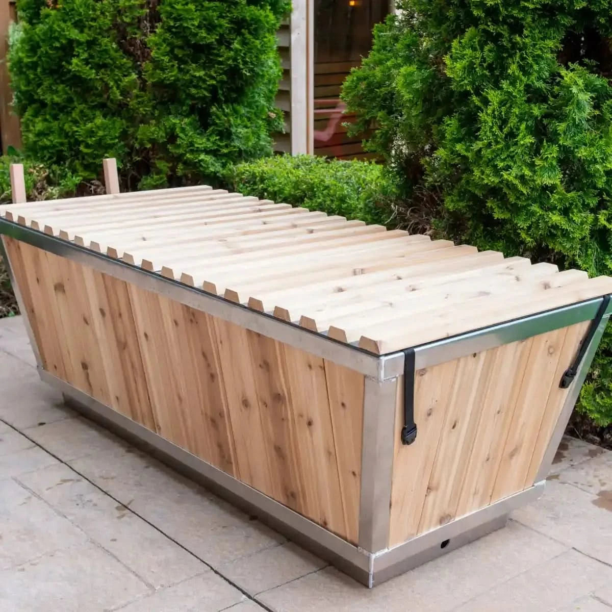 The Dundalk Leisurecraft Polar Plunge Tub (CT362PP) featuring the optional Canadian Timber Collection roll-up cover on top.