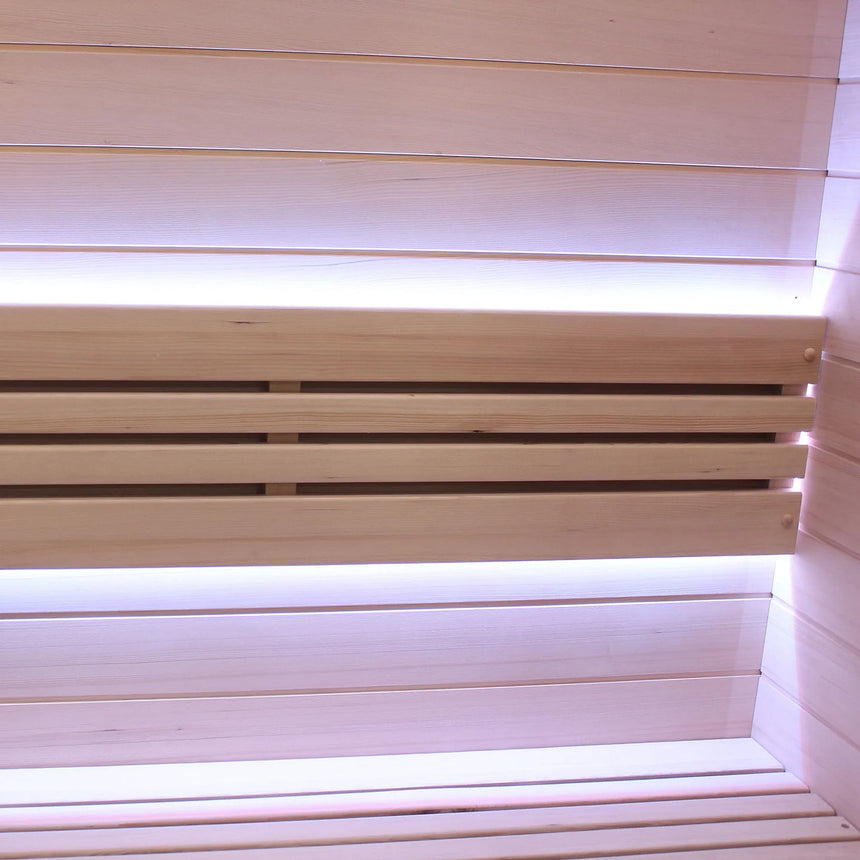 Backrest inside the Revive 2 Person Traditional Sauna lit by LED strips above and below