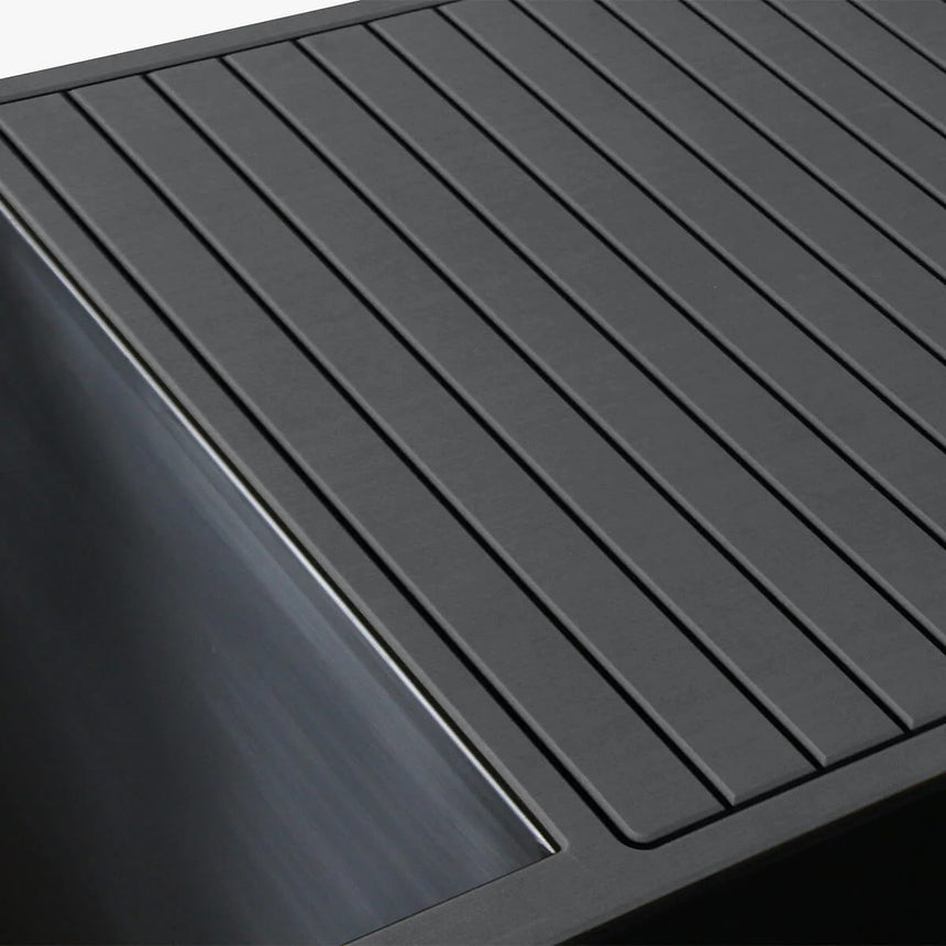 Revive Luxury Plunge grey EVA foam decking next to the stainless steel tub