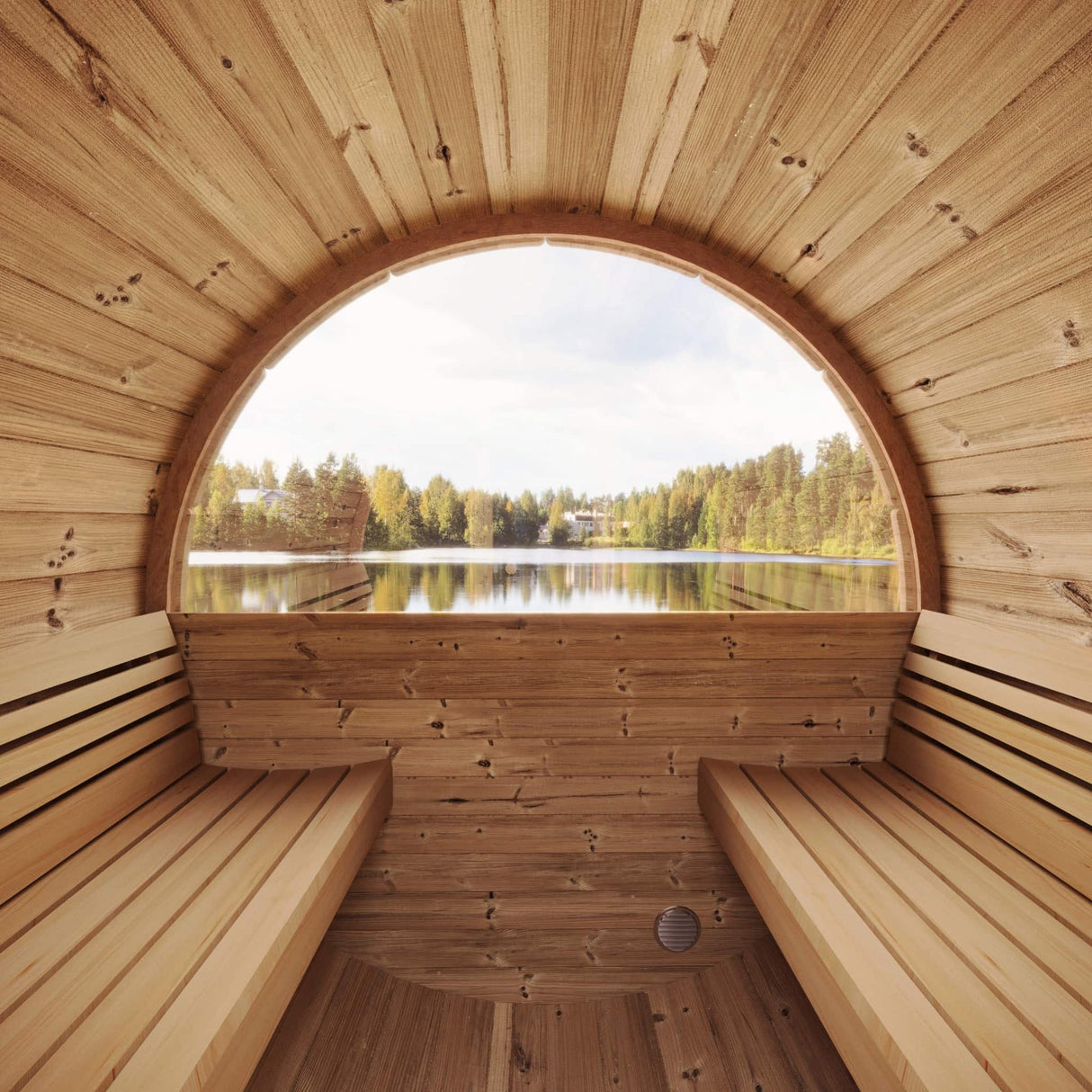 Interior shot of the E7W showing the full panoramic window view of the lake/landscape.