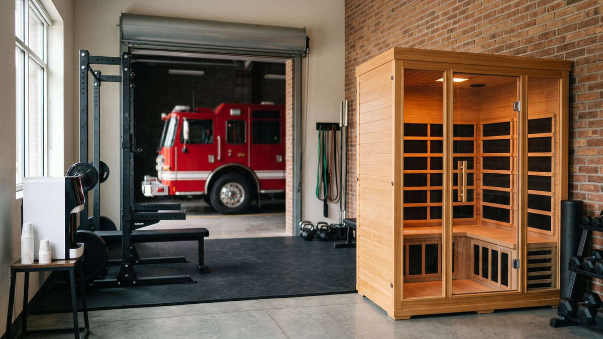 Sauna for firefighters: an infrared sauna cabin in a fire station fitness room
