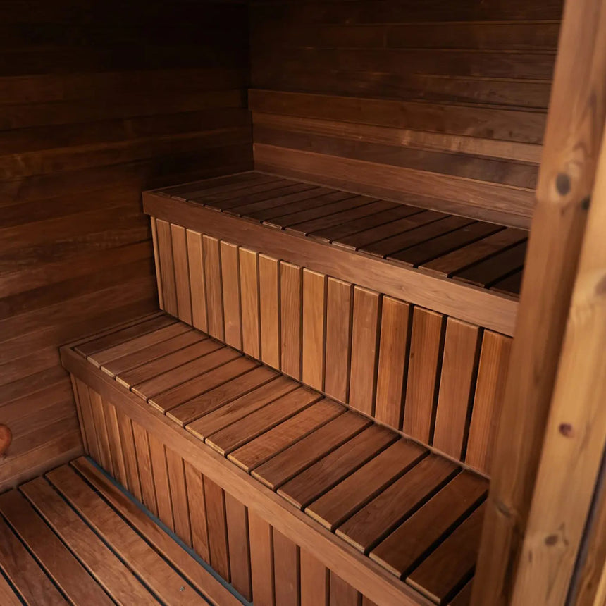 Two straight benches, an upper and a lower tier, inside the Celsium Jonas Classic outdoor sauna