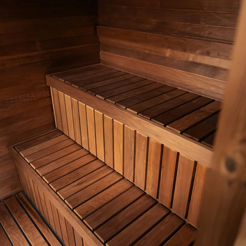 Two-tier benches inside the Celsium Jonas Classic, seen from the doorway