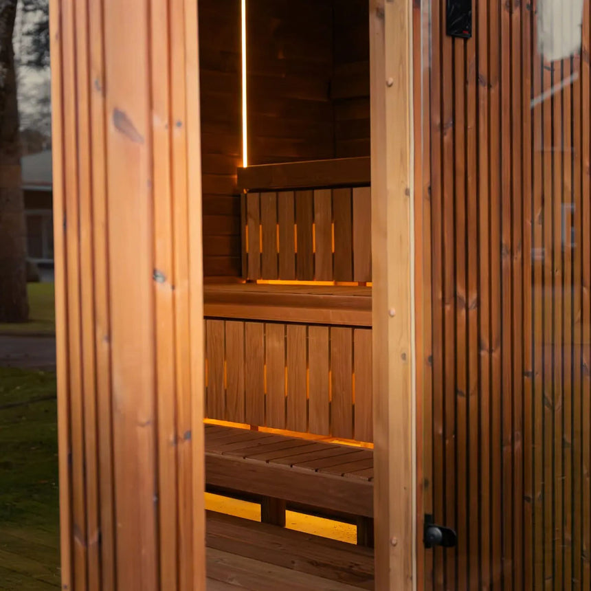 View through the doorway of the Celsium Jonas Grand to two-tier benches lit by LED strips