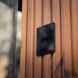 Harvia sauna control panel shown mounted on the exterior wall of the Celsium Jonas Grand