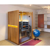 Clearlight Sanctuary 2 full spectrum infrared sauna in home gym front view with exercise equipment