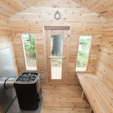 The interior of a Dundalk LeisureCraft CT Georgian Cabin Sauna (CTC88E), showing the glass door and windows that provide natural light and a view of the outdoors.