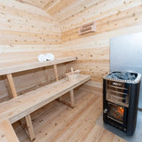 A close-up view of the interior of a Dundalk LeisureCraft CT Georgian Cabin Sauna (CTC88E), showing the electric Harvia sauna heater.