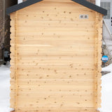 The back exterior of a Dundalk LeisureCraft CT Granby Cabin Sauna (CTC66E), showing the cabin log walls and rear air vents.