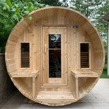 A front exterior view of the Dundalk Leisure Craft CT Tranquility MP Barrel Sauna (CTC2345MPE), featuring two small benches and windows flanking the main entry door.