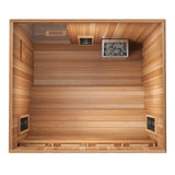 Finnmark FD-5 Trinity XL sauna top-down interior view showing two-tier cedar benches, Harvia KIP traditional heater with stones and infrared panels.