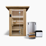 Revive 2 Person Traditional Sauna and Revive Inflatable Barrel Plunge side by side: the hemlock sauna with its glass door, touchscreen control panel, two-tier benches, bucket and ladle and the heater behind a wooden guard, and the barrel with its cover strapped on, its inflatable step in front and its chiller beside it