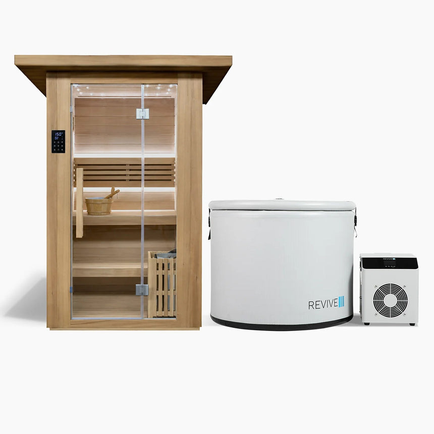 Revive 2 Person Traditional Sauna and Revive Inflatable Pod Plunge side by side: the hemlock sauna with its glass door, touchscreen control panel, two-tier benches, bucket and ladle and the heater behind a wooden guard, and the round white pod tub with its cover strapped on and its 0.3 HP chiller beside it