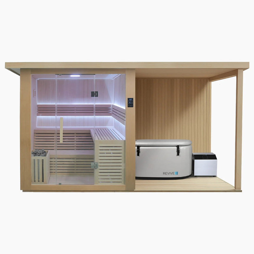 Revive 4 Person Extended Sauna and Revive Inflatable Plunge: the sauna with its full glass front and glass door, touchscreen control panel, L-shaped two-tier benches, LED lighting and the heater behind a wooden guard, and the covered deck beside it, where the inflatable tub with its cover strapped on stands along the back wall with its chiller beside the tub's end