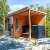 Three-quarter view of the Revive 4 Person Traditional Sauna Deck Extension outdoors, holding the Revive Luxury Plunge and its step, with a towel hanging on the wall beside the sauna's glass front; the sauna and plunge are sold separately