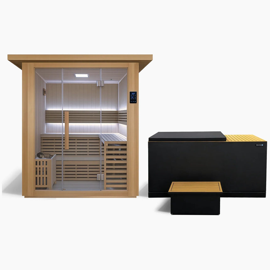 Revive 4 Person Traditional Sauna and Revive Luxury Plunge side by side: the sauna with its full glass front and glass door, touchscreen control panel, L-shaped two-tier benches, LED lighting, bucket and ladle and the heater behind a wooden guard, and the black-cabinet plunge with tan decking, its tub cover on and the matching step in front