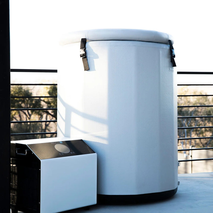 Revive Inflatable Barrel Plunge with insulated cover and chiller on an outdoor terrace
