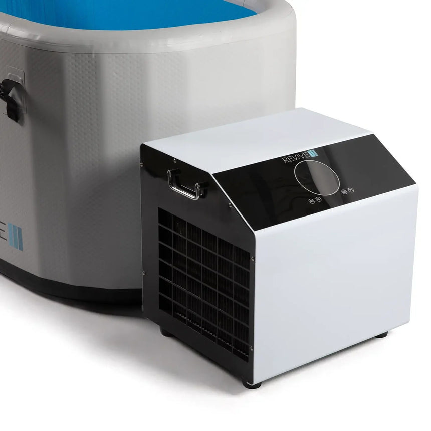 Revive Inflatable Plunge chiller with digital control panel beside the tub