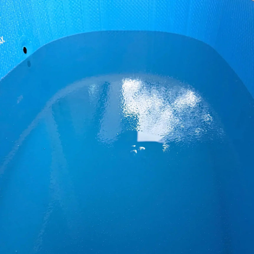 Water in the blue interior of the Revive Inflatable Tub