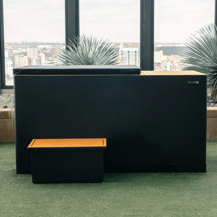 Revive Luxury Plunge with insulated tub cover and matching step on a rooftop terrace