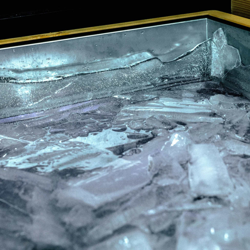 Ice formed in the stainless steel tub of the Revive Luxury Plunge
