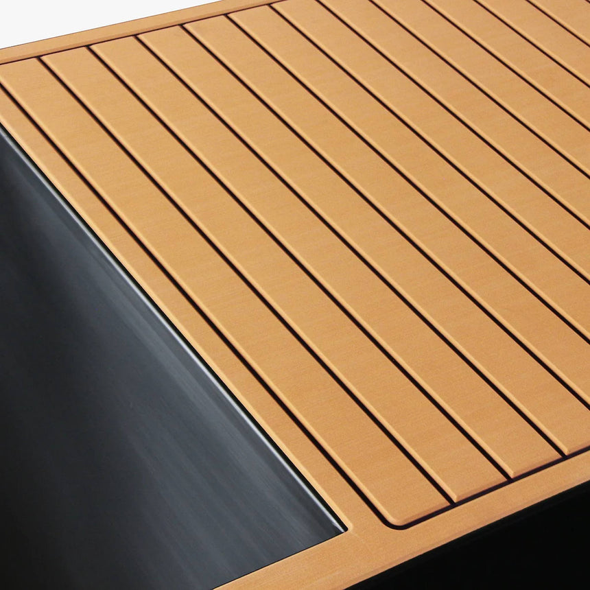 Revive Luxury Plunge tan EVA foam decking next to the stainless steel tub