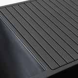 Revive Luxury Plunge grey EVA foam decking next to the stainless steel tub