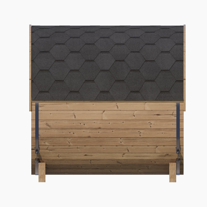 Exterior side view of the E7G Barrel Sauna showing the black shingle roof and secured barrel bands.