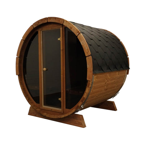 Angled exterior view of the E7W Barrel Sauna featuring the dark shingle roof and glass door.