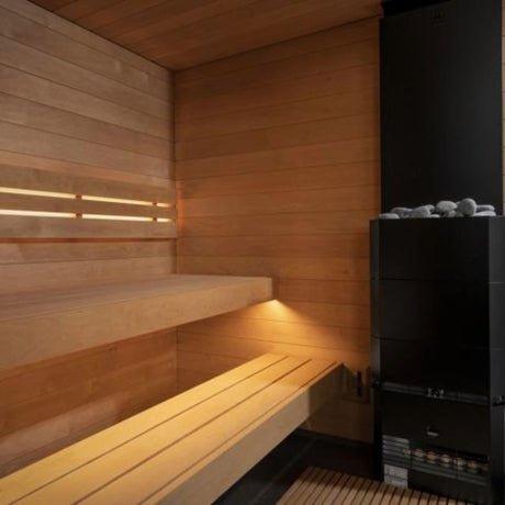 SaunaLife Model G6 sauna interior corner showing alder benches with LED under-bench lighting and electric sauna heater.
