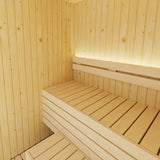 SaunaLife Model X2 2-person Xperience Series sauna interior corner detail showing aspen benches with LED backrest lighting and Nordic spruce walls.